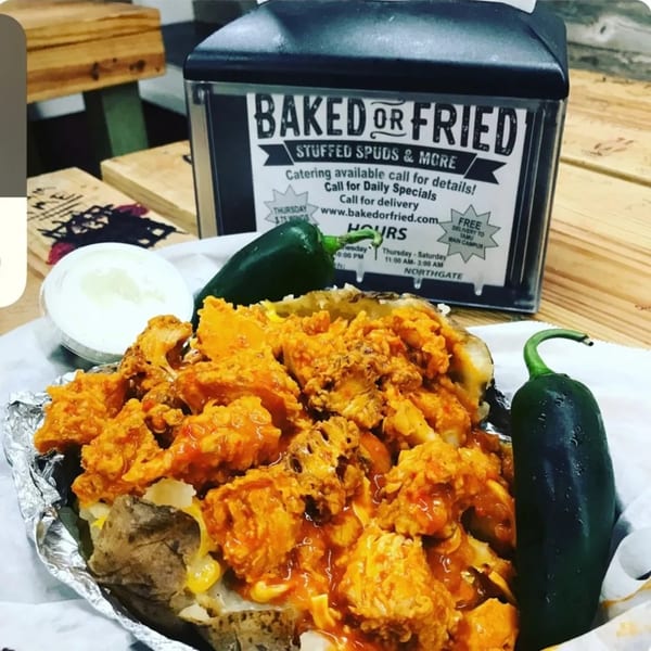A Baked or Fried stuffed potato with buffalo chicken, cheese, and two jalapeños.